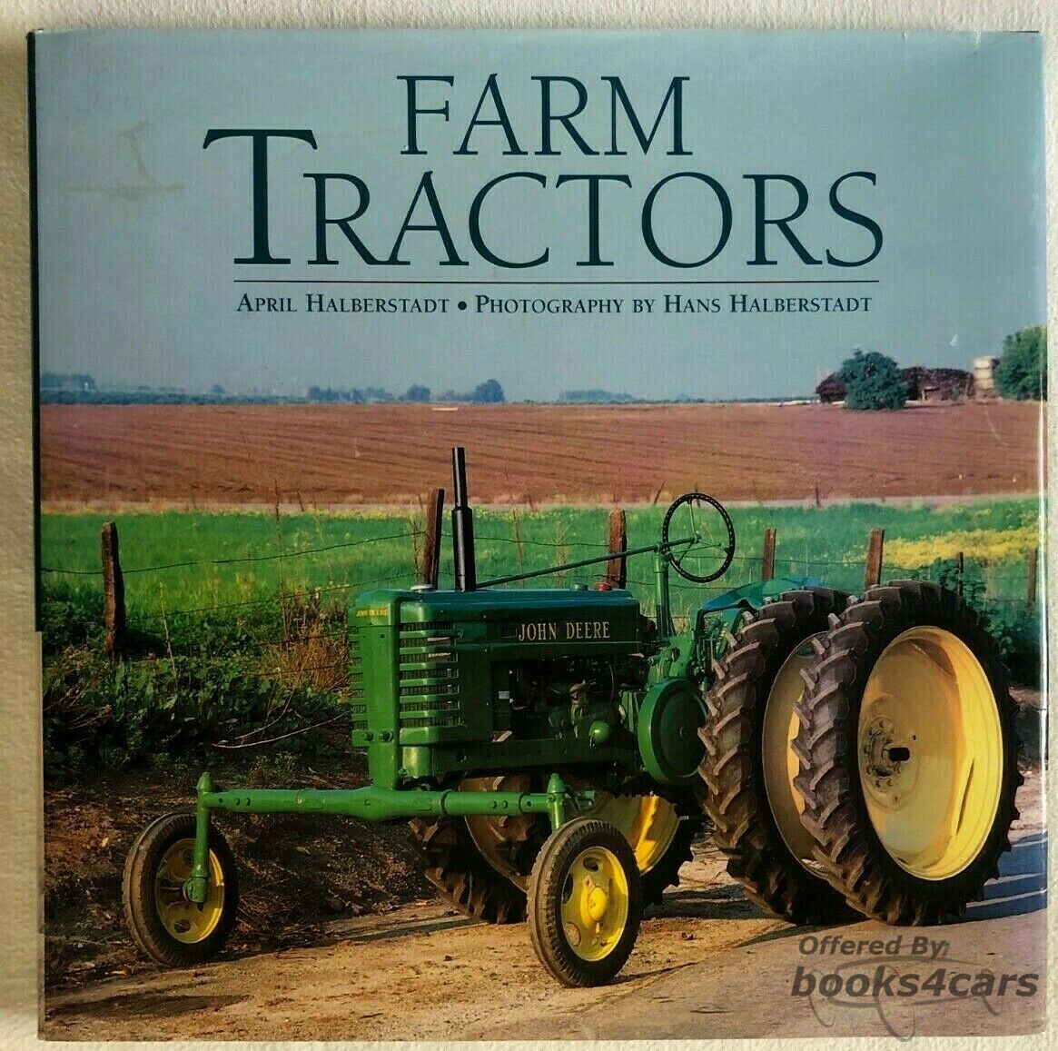 view cover of Farm Tractors - A Historical overview of these farming machines by April Halberstadt with photos by HAns Halberstadt